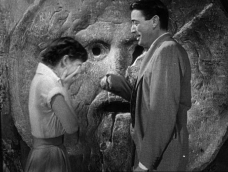 Audrey_Hepburn_and_Gregory_Peck_at_the_Mouth_of_Truth_Roman_Holiday_trailer.jpg